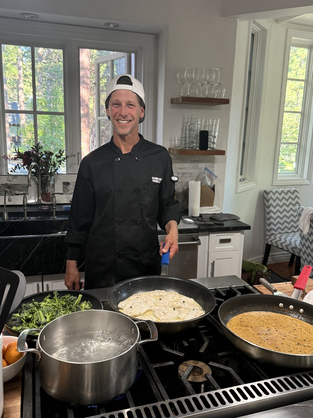 Private chef Shawn Kroop cooking dinner in a Lake Tahoe home kitchen